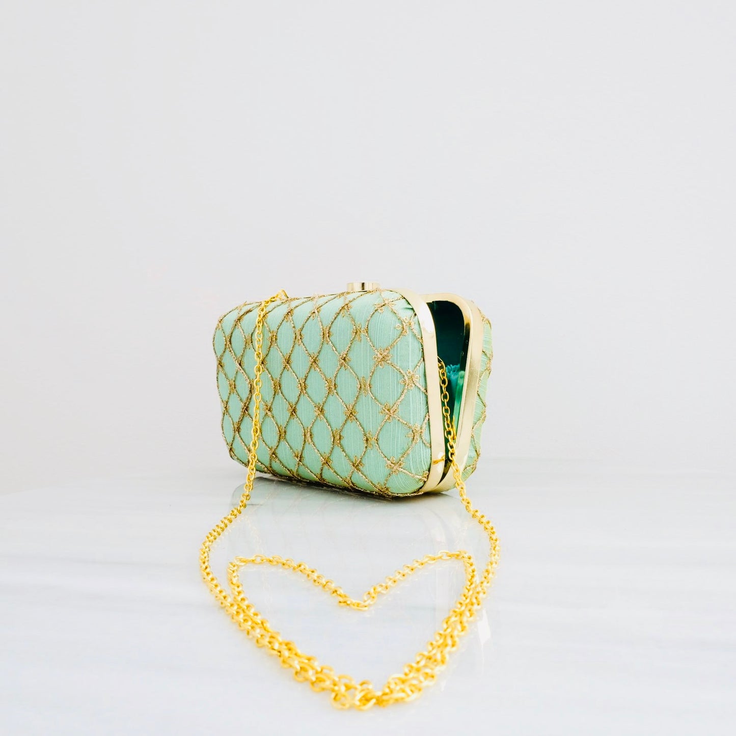 Clutch in turquoise/goud