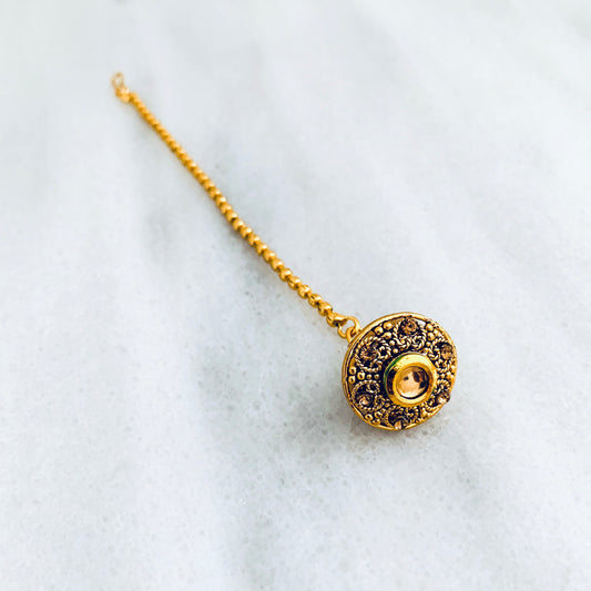 Golden borla tikka