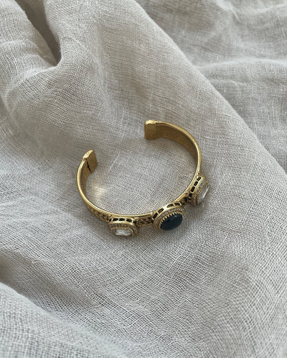 Gold colored bracelet - black