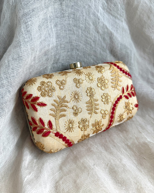 Clutch in goud/rood