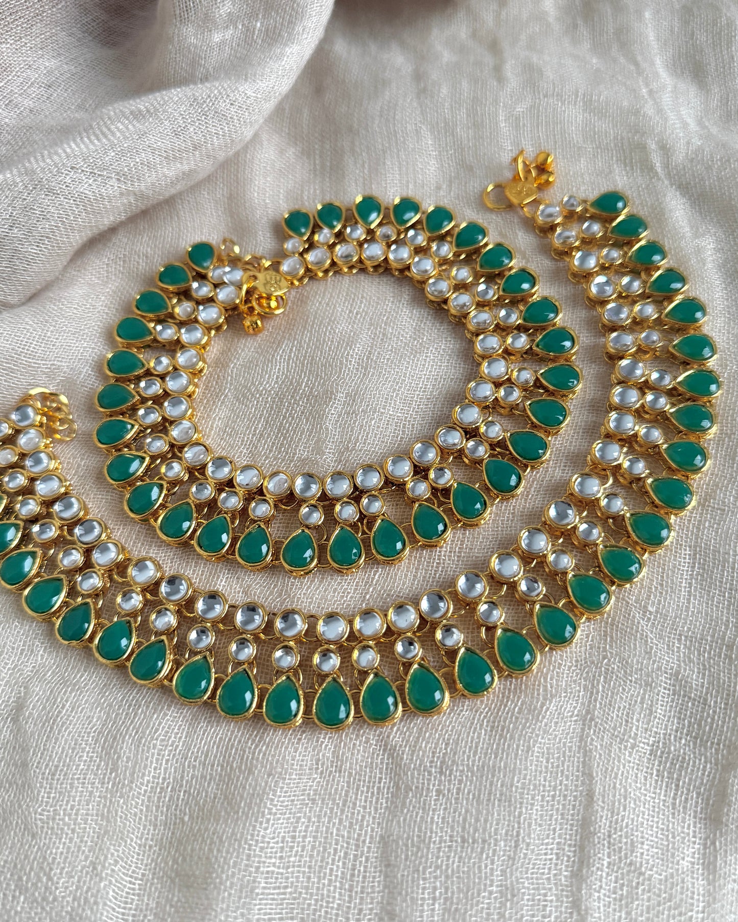 Goudkleurige brede payals