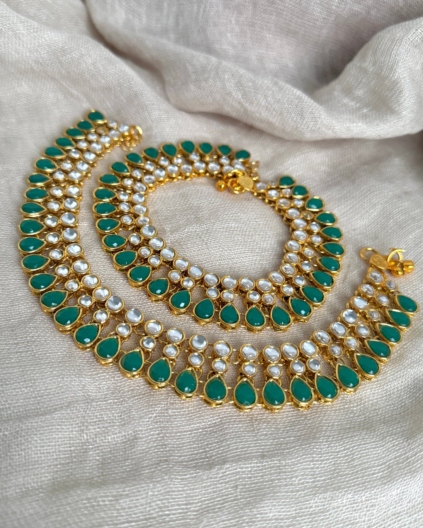 Goudkleurige brede payals