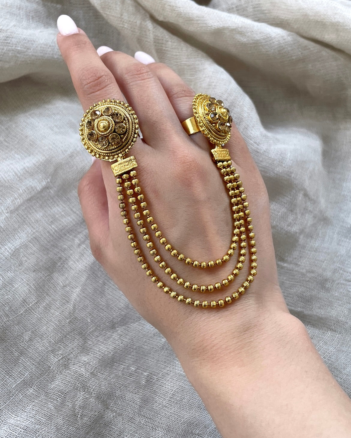 Gold colored double ring - round