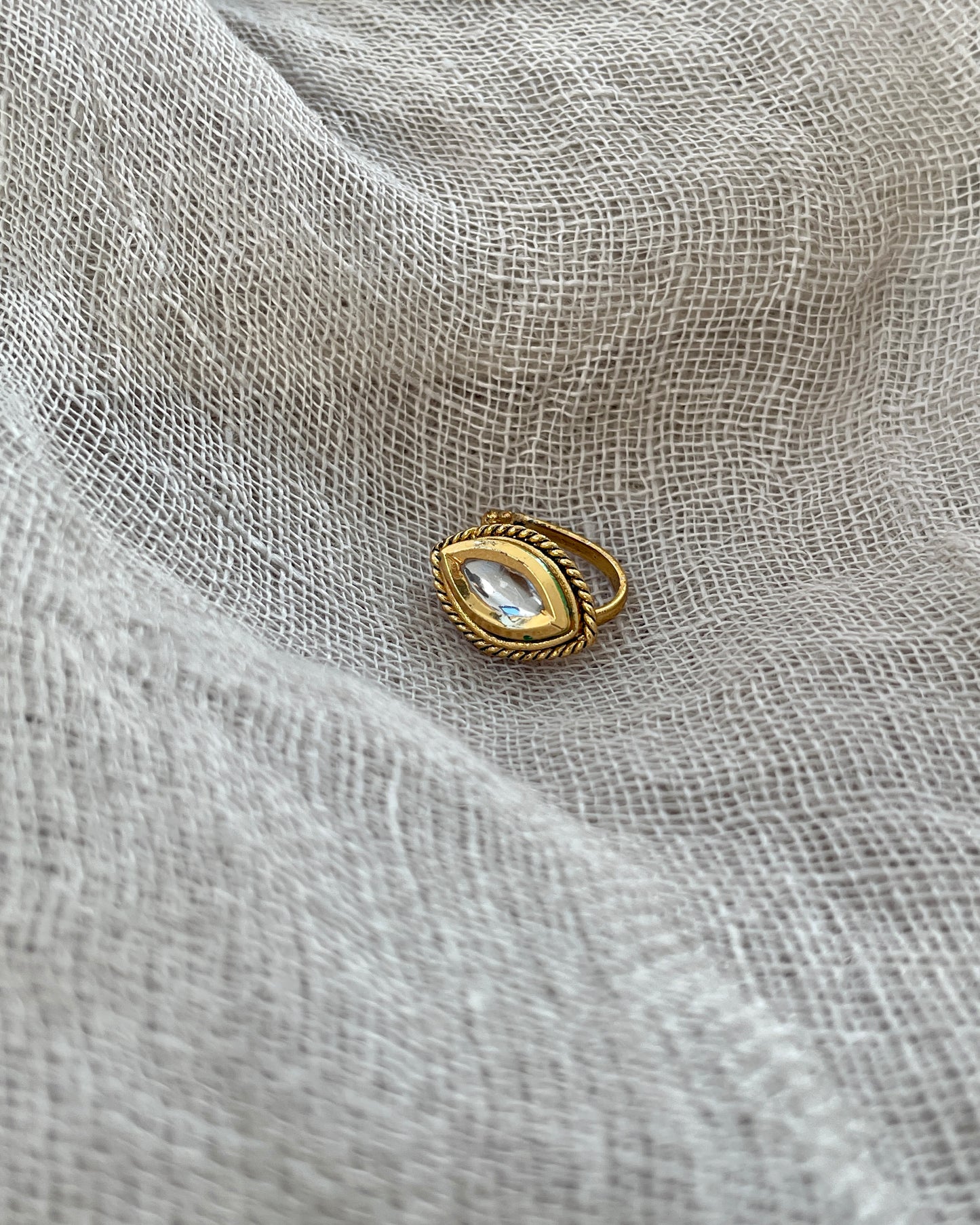 Gold colored nose clip white