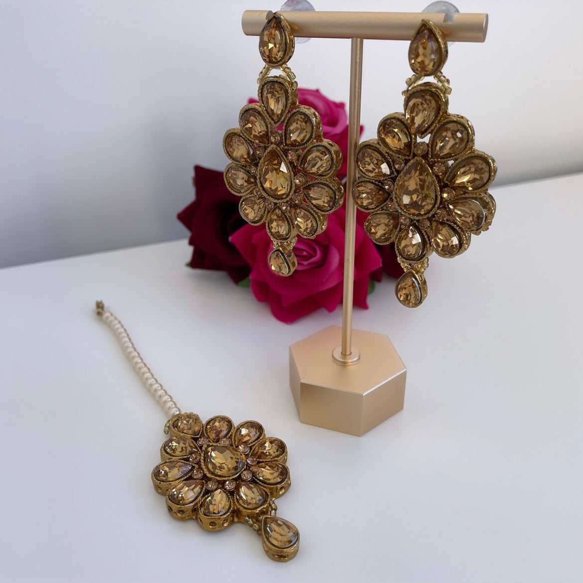 Gold colored maang tikka set
