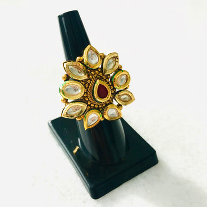 Gold colored kundan ring white-red